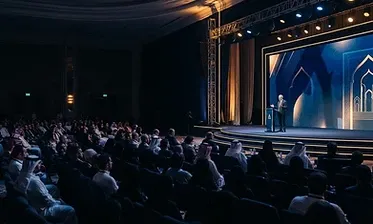 Event photographer covering a corporate conference in Riyadh, Saudi Arabia