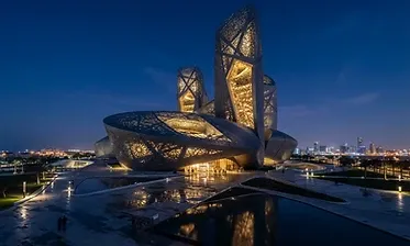 Modern hotel architecture in Makkah photographed at blue hour