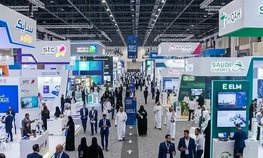 Exhibition photographer documenting a trade show stand in Riyadh
